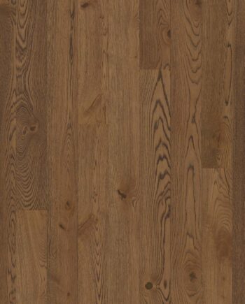 Parketti Bauwerk Boen Casapark Oak 46 Vivo Tartufo (138 mm), harjattu ja öljyvahattu, asennettuna kodin lattialle – lämmin ruskean sävyinen (Tartufo) tammi ja rustiikkinen sorteerus (oksakohtia sekä selkeää sävyvaihtelua). Harjattu pinta korostaa puun eläväistä tekstuuria.