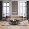 Engineered wooden flooring Bauwerk Boen Casapark Oak 46 Vivo brushed Avorio light oil-waxed installed on a living room floor. Classical modern mix stile with design sofa and chair. Nice design lightning. Marble top metallic side sofa table. Disain carpet.