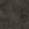 Vinyylilaatta Quick-Step Illume Soft Graphite asennettuna modernin kodin lattialle – tumma grafiitinharmaa sävy ja elegantti, hillitty kivimäinen/betonimainen design hienovaraisella tekstuurilla.